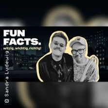Zwei Personen vor einer stilisierten Stadtsilhouette mit dem Text 'FUN FACTS. witzig, wichtig, richtig!'