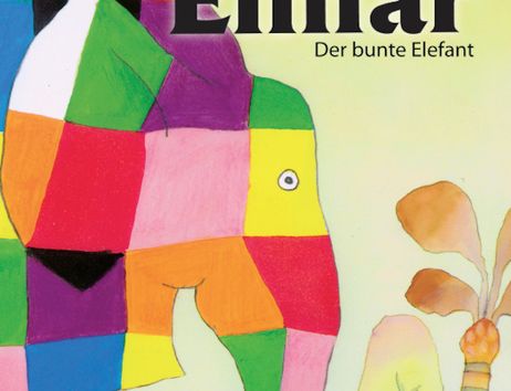 Illustration von Elmar, dem bunten Elefanten, mit einem Patchwork-Muster aus verschiedenen Farben.