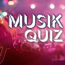 Ein Bild mit dem Text 'Musik Quiz' vor einem verschwommenen Hintergrund mit bunten Lichtern und Musiknoten.